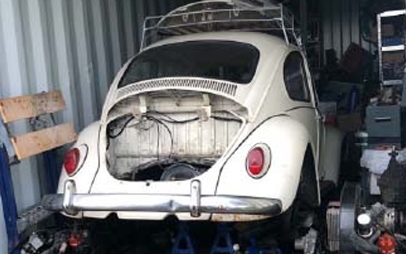 Earl the white Beetle undergoing some work