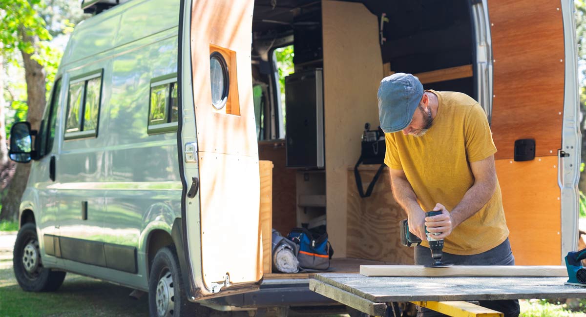 Man converting a van into a campervan
