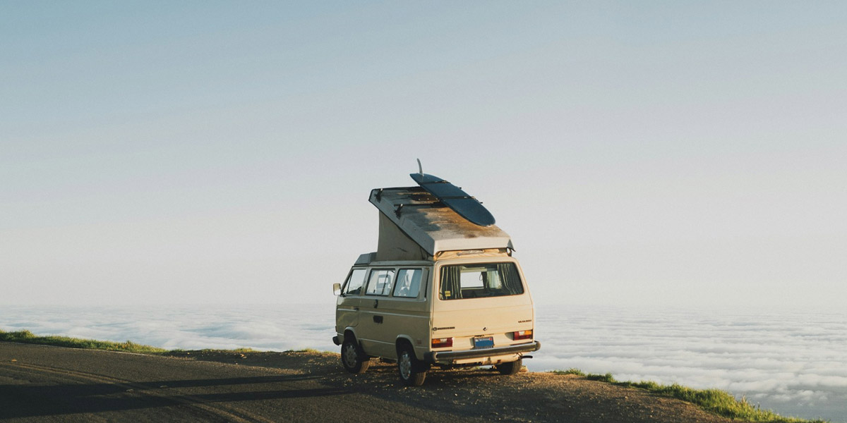 VW-Camper-on-a-mountain-view-point-above-the-clouds VW Camper on a mountain view point above the clouds