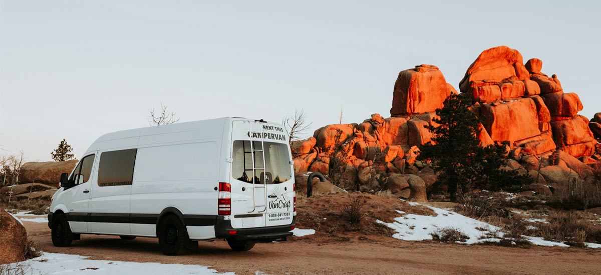 Large campervan in a rocky landscape