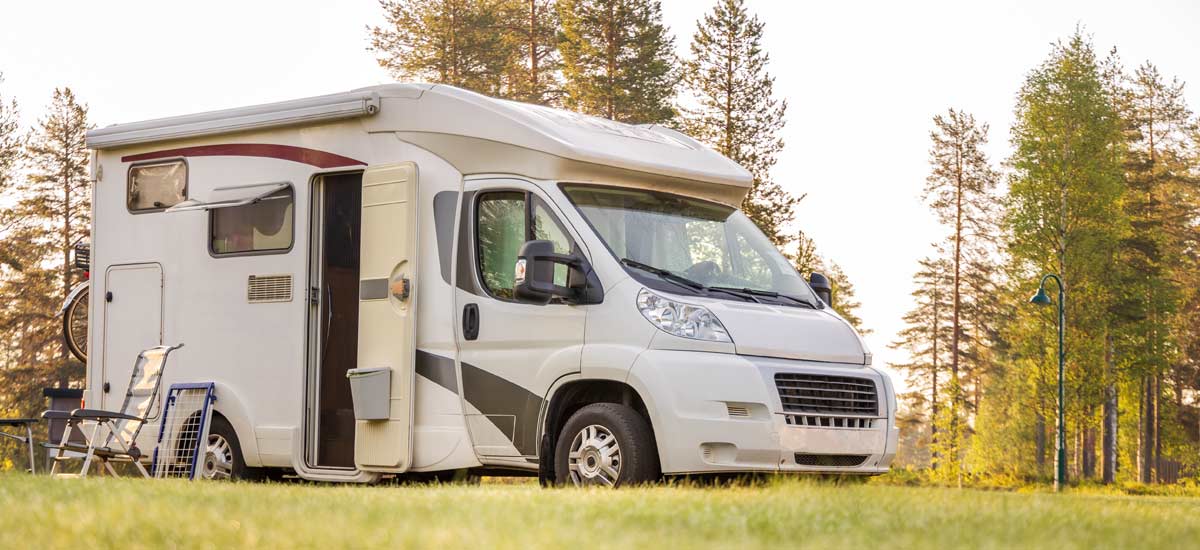Motorhome in a sunny field
