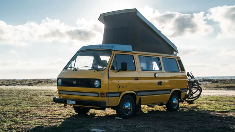 A VW T25 Westy Poptop Parked At The Coast A VW T25 Westy Poptop Parked At The Coast