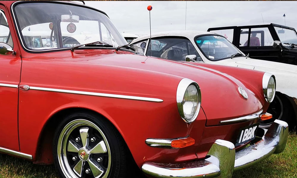 JKI25-VW-Type3-Insurance-Header-1 A red VW Type 3 parked up at a classic car show