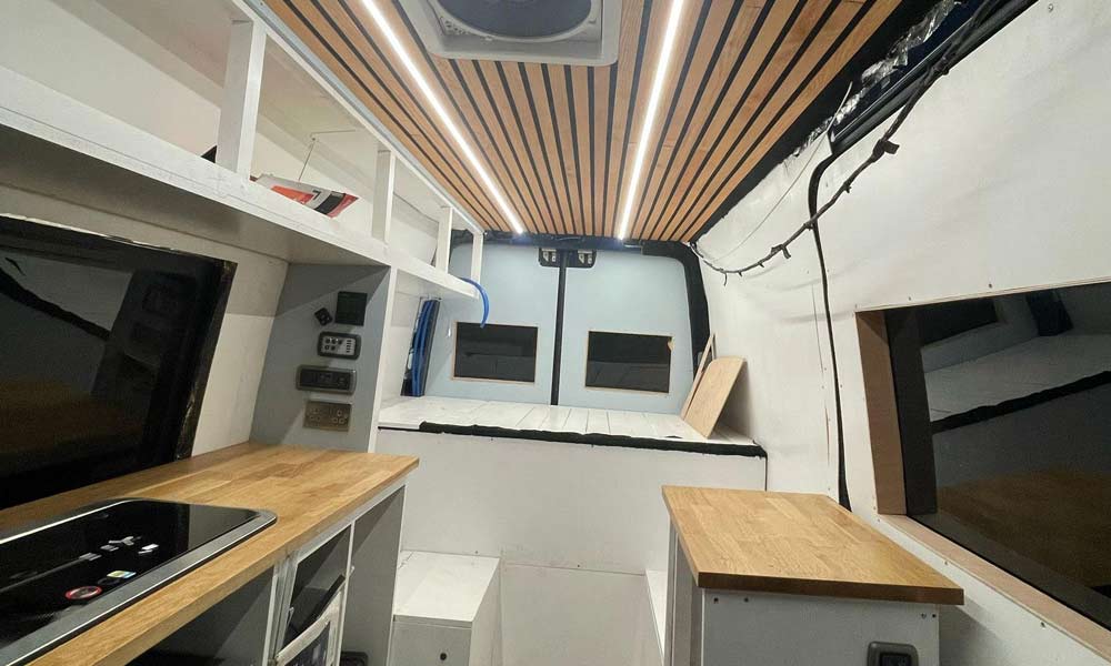 JKI25-Self-Build-Image-Header-1 The inside of a self build campervan which was converted by a couple with help from Just Kampers
