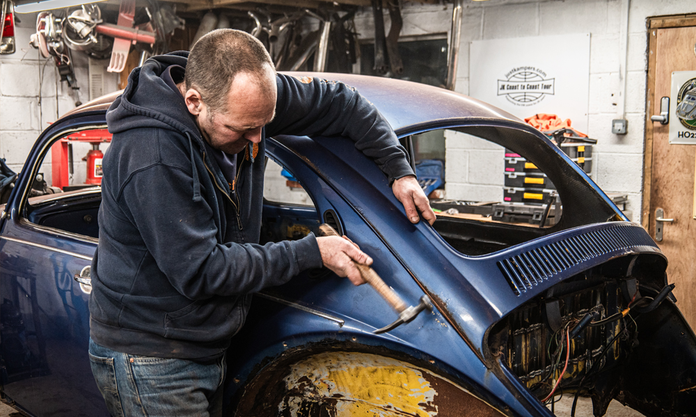 Salvage-Retention-Policy-Benefit-Page-Header-Image-for-Just-Kampers-Insurace Pete from Just Kampers fixing up a VW Beetle