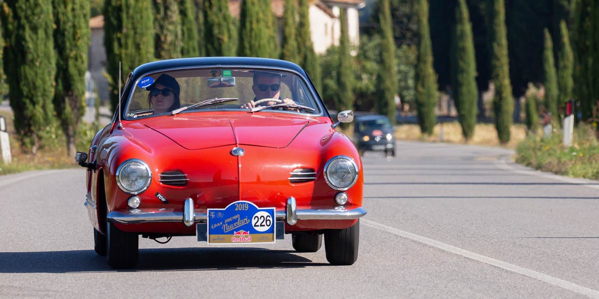 Pros-and-cons-driving-classic-car-every-day Red Karmann Ghia on the road