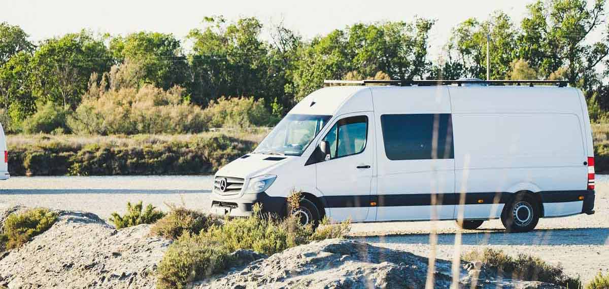 White converted campervan parked up