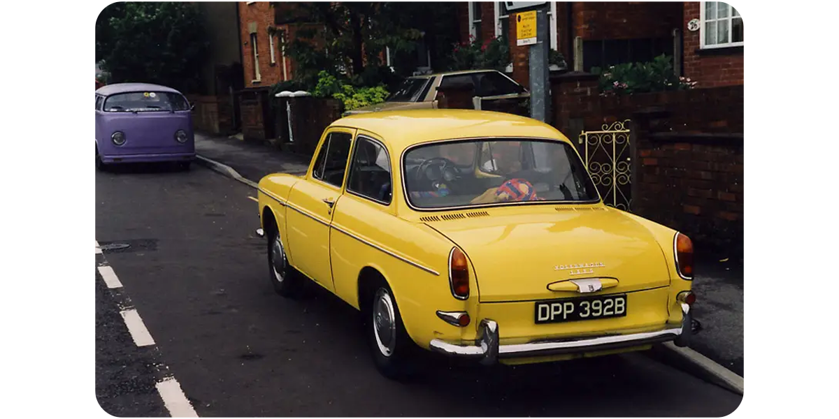 A photo from the 1990s showing a yellow VW Type 3