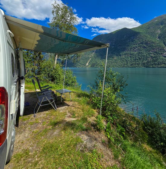 View of a lake through campervan awning