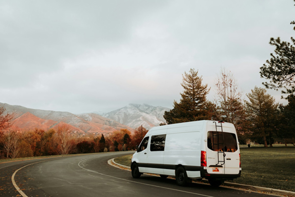 Converted camper driving away