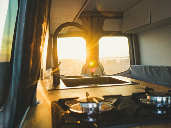 Converted campervan interior kitchen